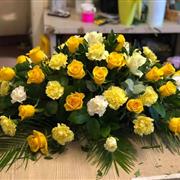 Yellow and white Casket spray